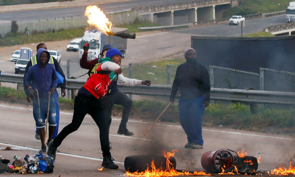 : Supporters of former South African President Jacob Zuma attend a protest in Peacevale