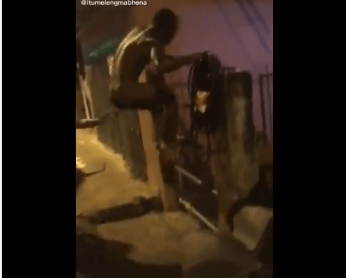 Video-Man-caught-cheating-jumps-an-unlocked-gate-naked