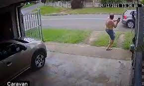 Man chase away armed robbers with huge brick.